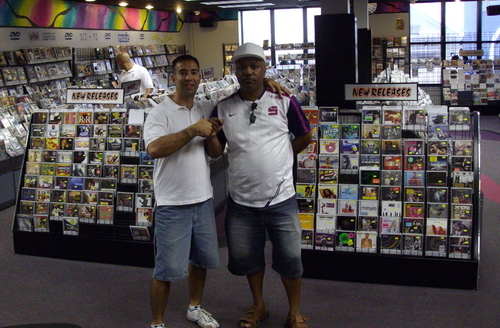 Clinark with Michael Mello Manager of MUSIC WORLD Bermuda major Record Shop